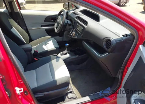 2014 Toyota Prius C from USA, damaged, VIN JTDKDTB38E1564132